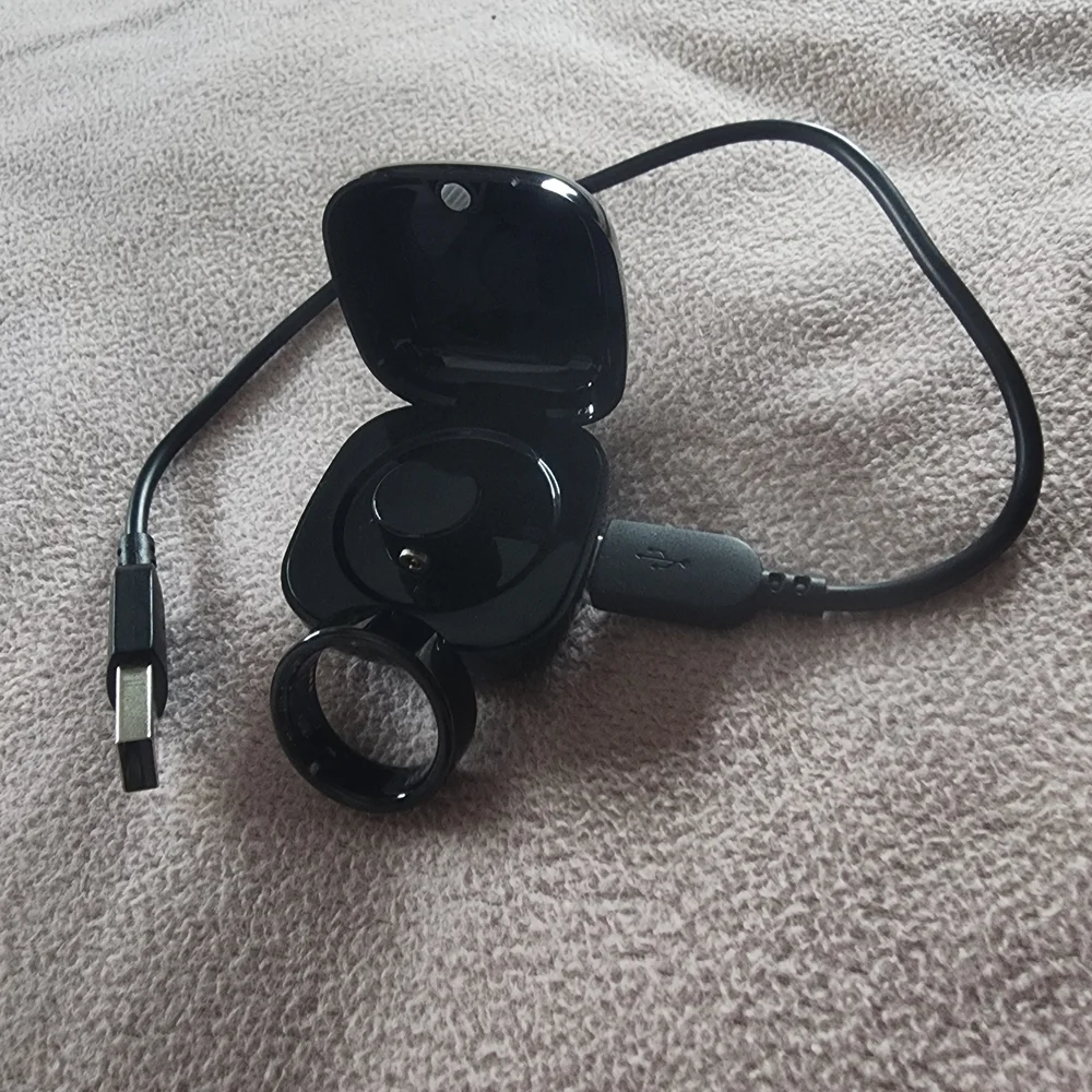 Sleek Black Smart Ring with Charging Case